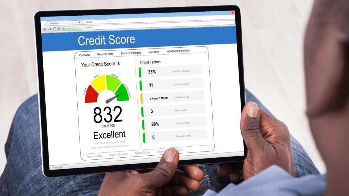 a person reviews their excellent credit score of 832