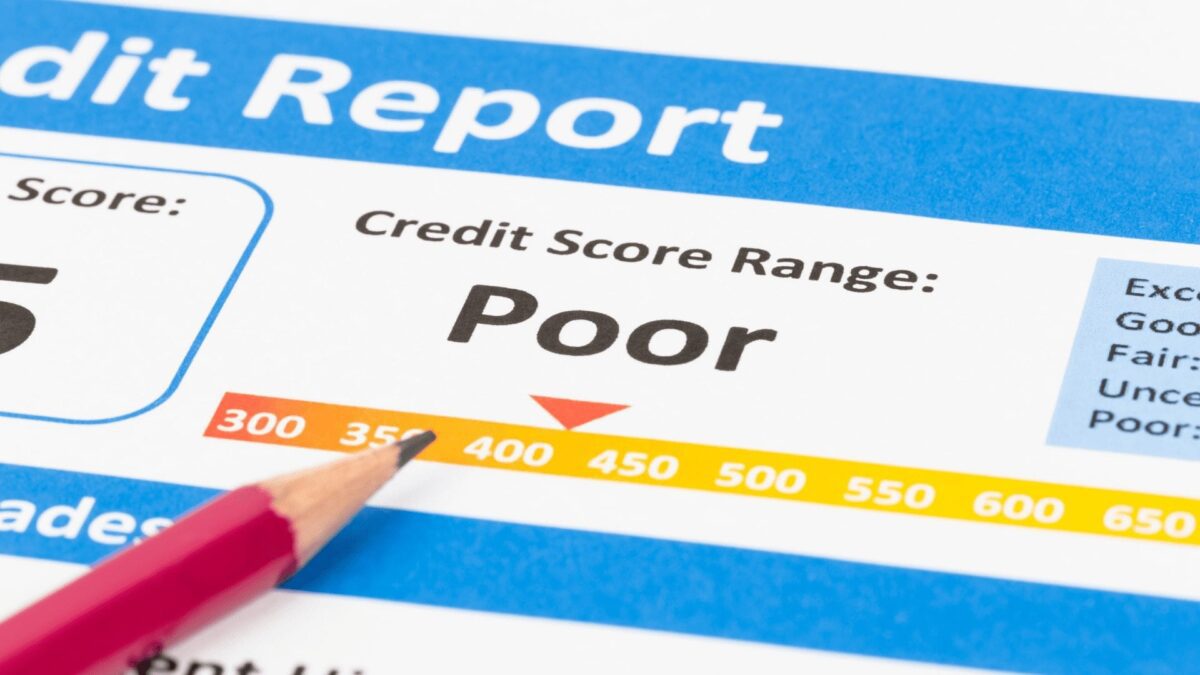 poor credit score report with pencil