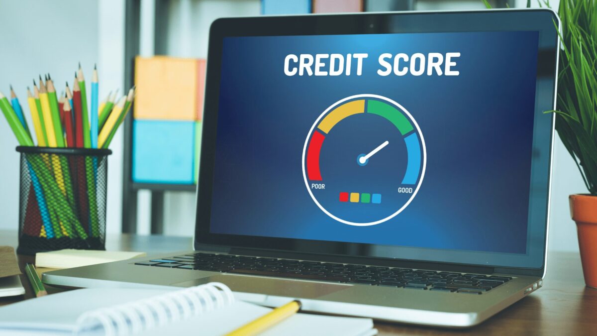 a computer screen with credit score meter on screen