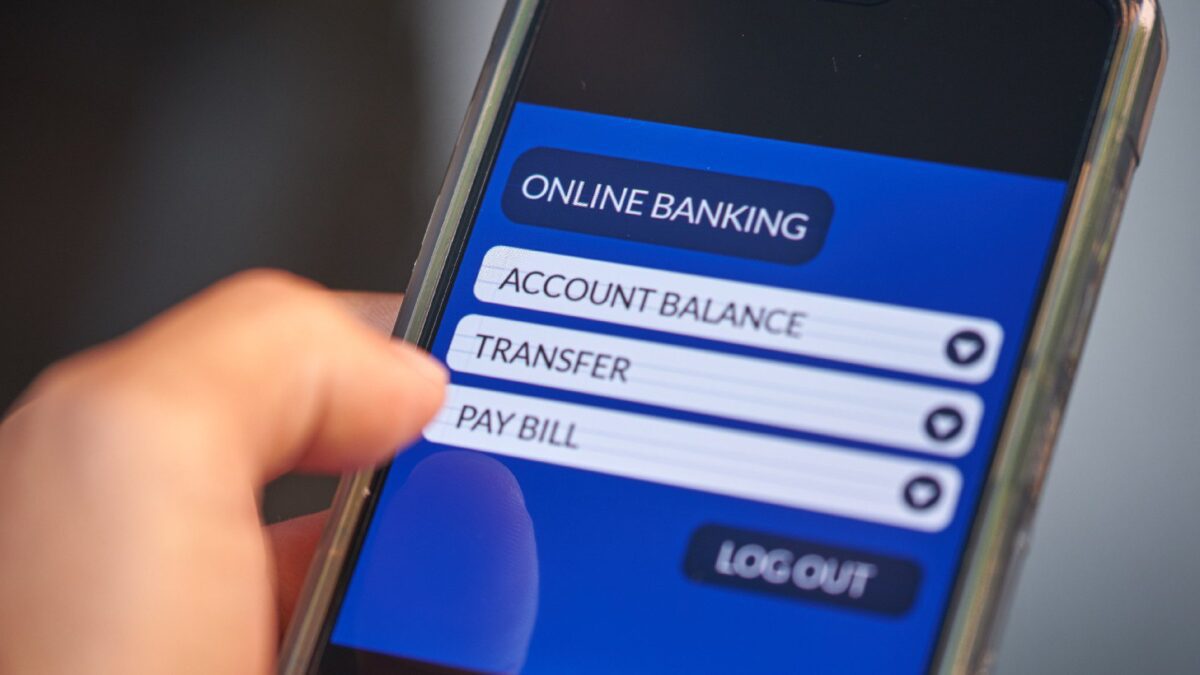 a mobile phone displays online banking information