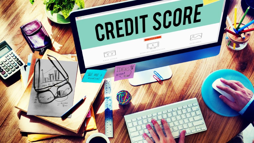a person checks their credit score on a computer monitor