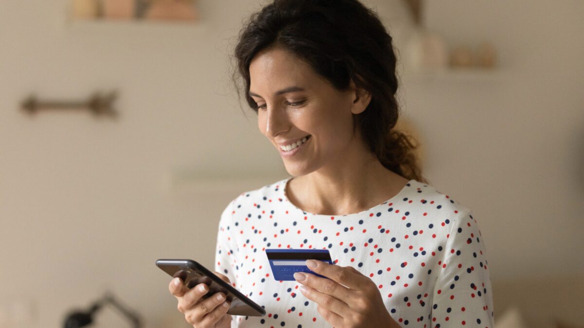 a person pays their loan online on a smartphone