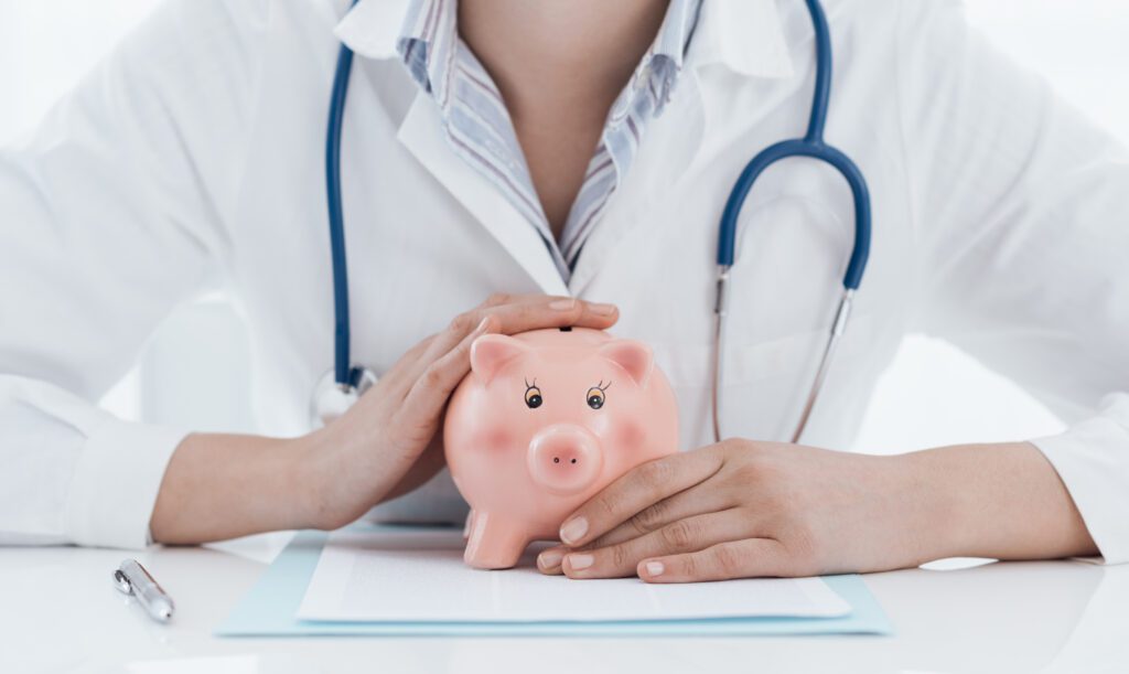 Doctor has her hands on a piggy bank | Wise Loan
