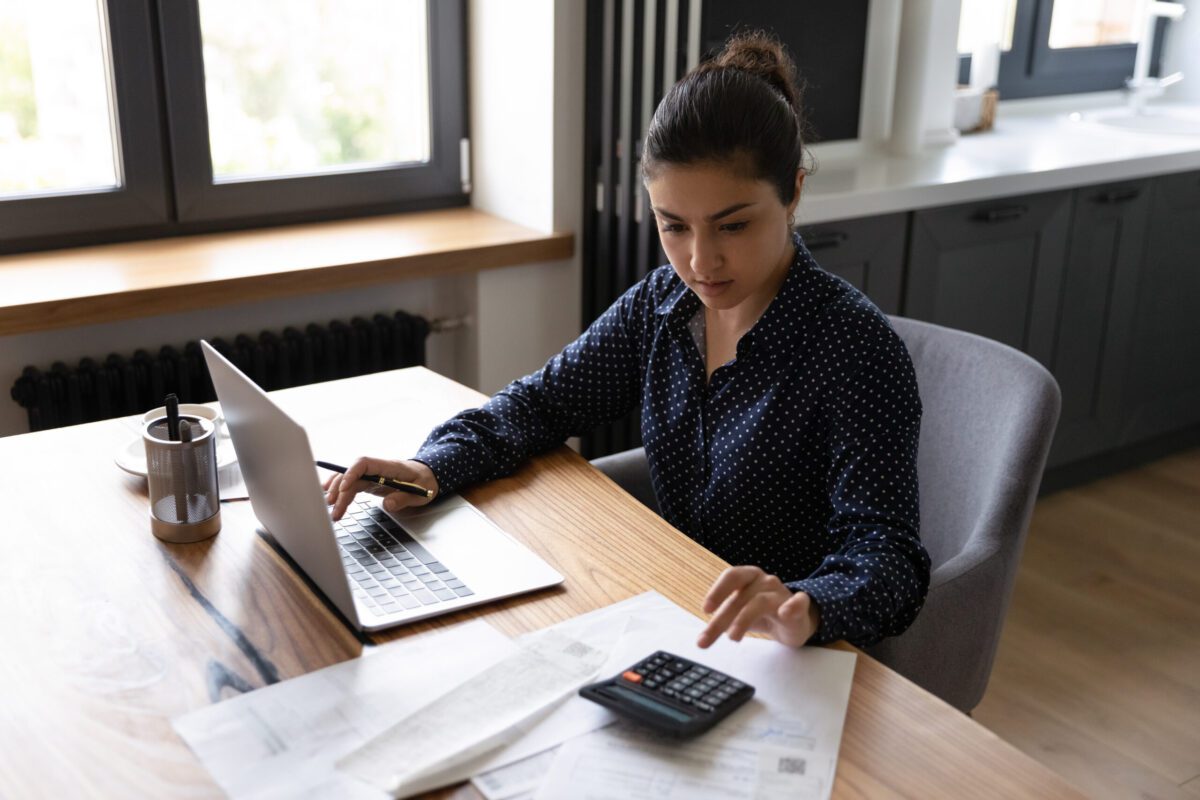 A lady reviewing different rates from lenders | Best personal loans