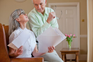 Stressed older couple with finances | Loans for bill payment