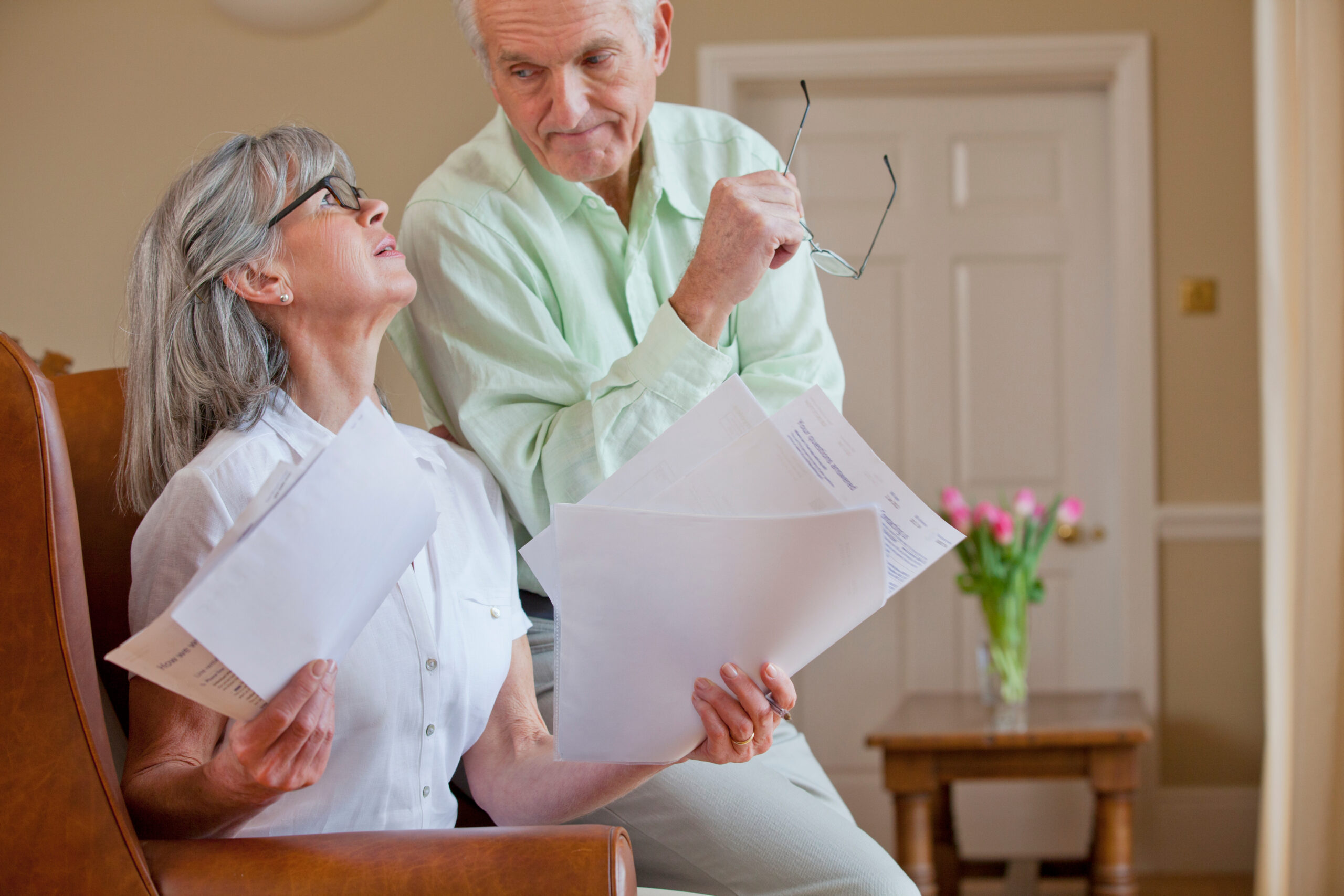 Stressed older couple with finances | Loans for bill payment