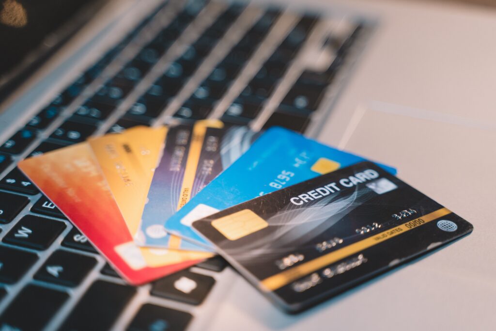 Stack of credit cards | How to build your credit score fast